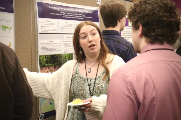 Junior Environmental Science Major Brynn Zimmerman discusses her project for the undergraduate research demonstrations in the Hamilton Room Thursday morning, March 21, 2024.