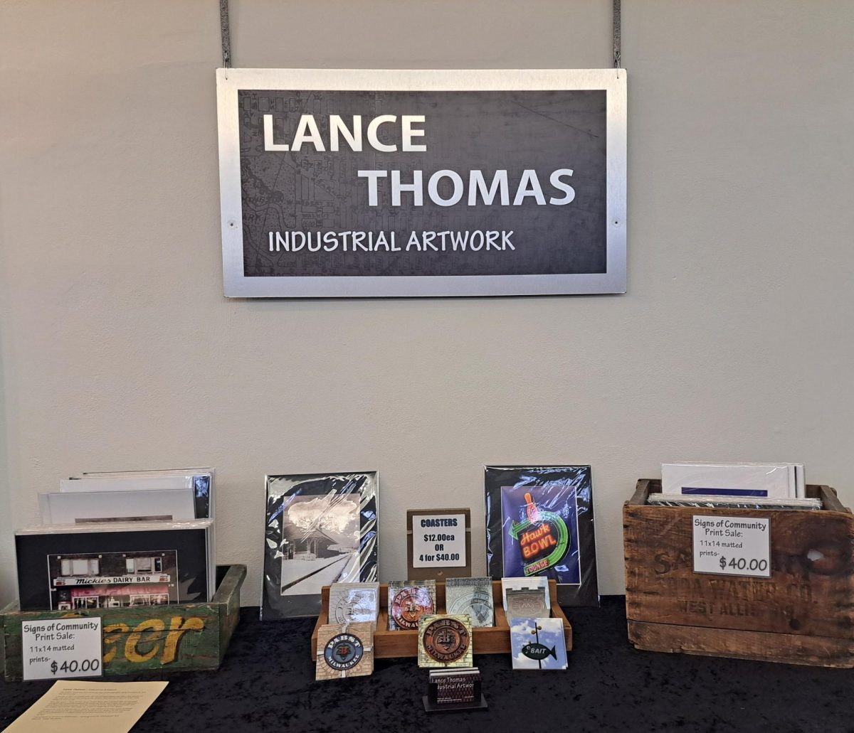  Seen here are prints of Lance Thomas’ artwork from his collection of Signs of Community at a reception held at Whitewaters Art Alliance located on Main Street Mar. 21 2024.
