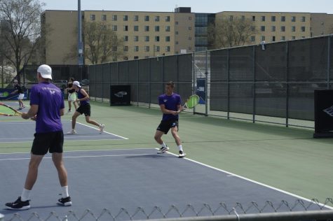 Luke VanDonslear goes for a back hand return during his doubles match against Stevens Point on Friday April 14th at Whitewater tennis complex.
