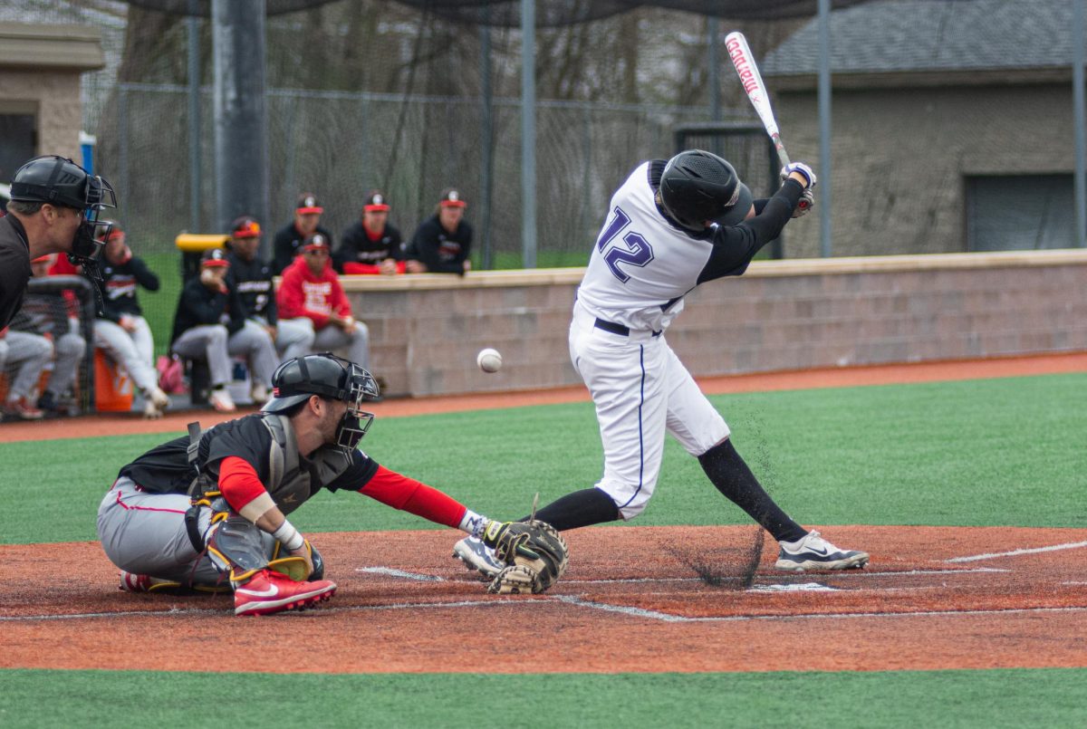 Sophomore Reese Fetherston swings for the fences against Carthage at Miller Stadium, Tuesday, April 16 