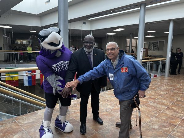 Chancellor Corey King poses with Willie the Warhawk and a marine veteran at the UW-Rock County at the Flock to URock Social, Wednesday, April 10, 2024.