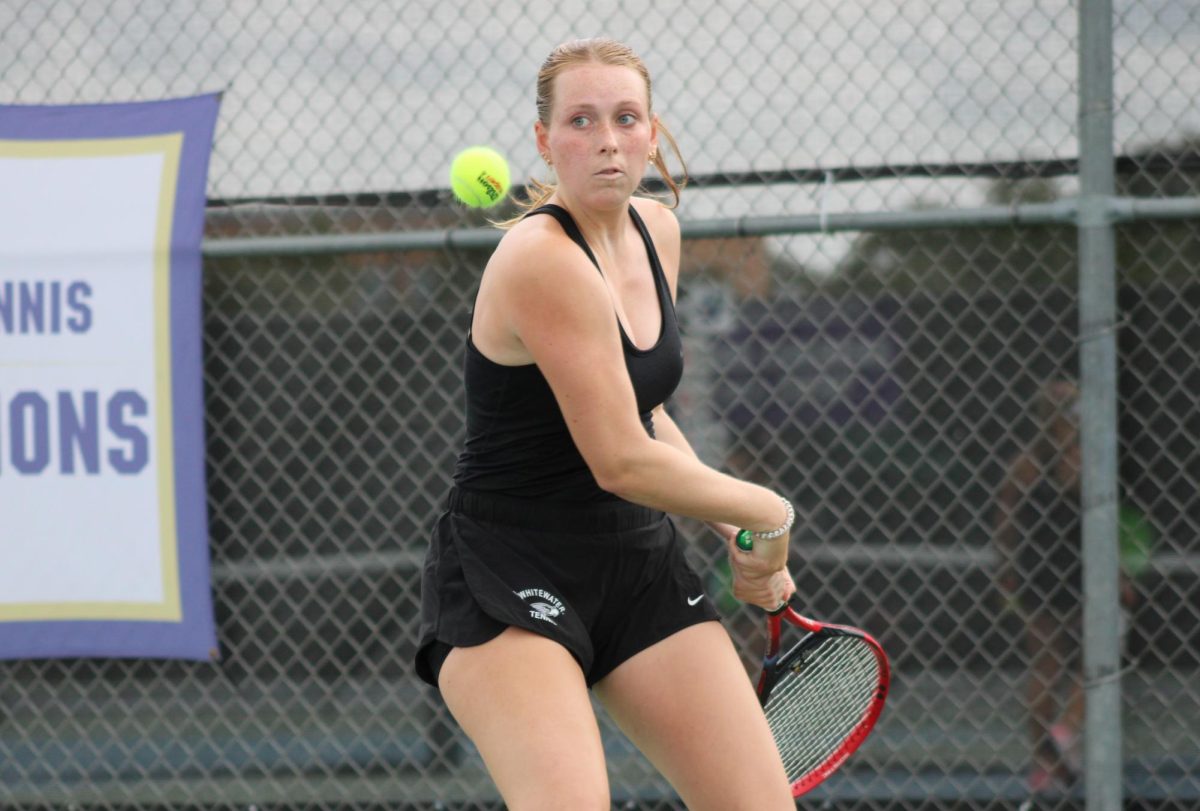 Cassie Lee prepares to hit a backhand in UW-Whitewater’s opening women’s tennis match of the 2024-25 season against UW-La Crosse at the Warhawk Outdoor Tennis Complex, Friday, August 30, 2024.