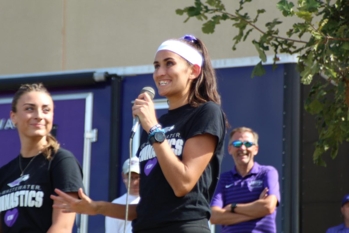 Senior Ari De La Cerda smiles as she talks into the microphone after the tournament, September 2024.