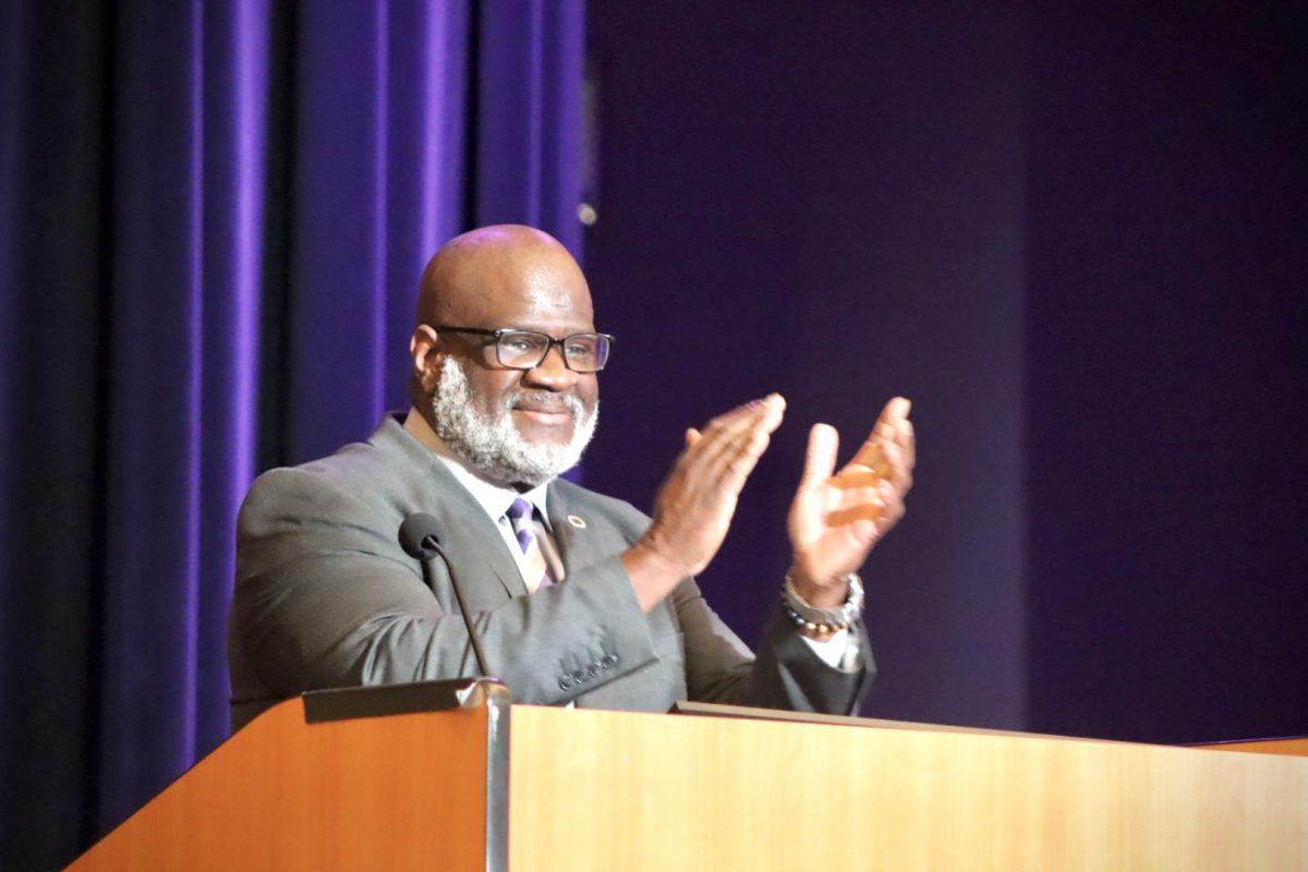 University of Wisconsin-Whitewater Chancellor Corey King applauds and thanks the Chancellor’s committee in an address. 