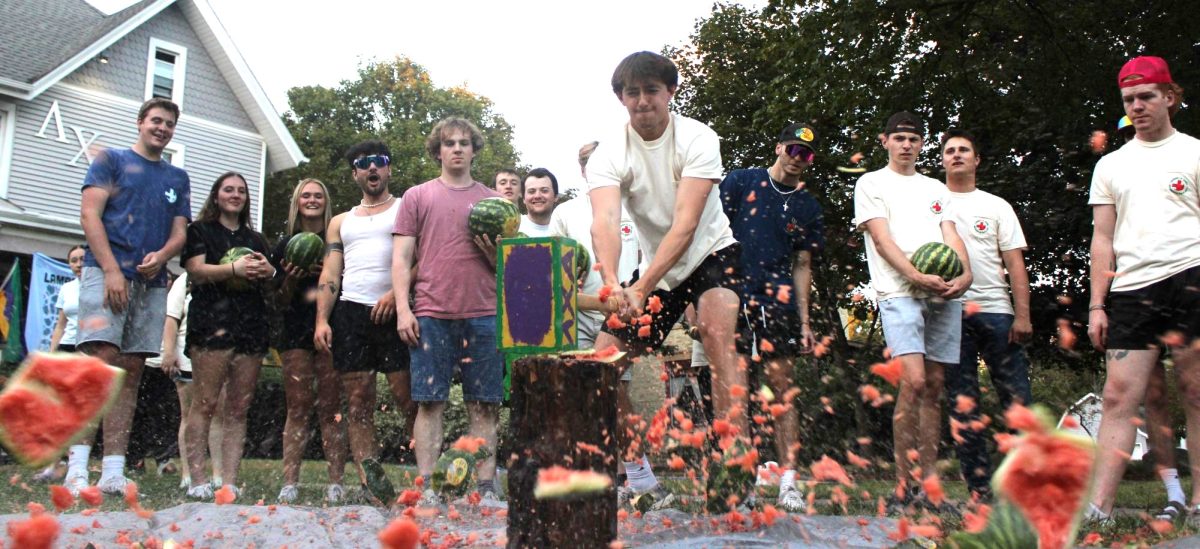 Lambda Chi Alpha member Spencer Weirsma smashes a watermelon.