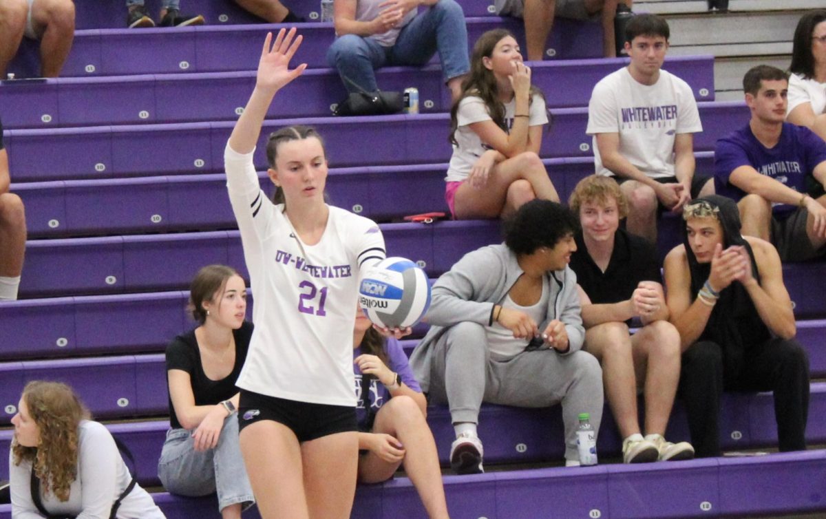 UW-Whitewater women’s volleyball player Aubrie Krzus gets ready to serve against Millikin University in UW-Whitewater’s Kris Russell Volleyball Arena Sept. 13 2024