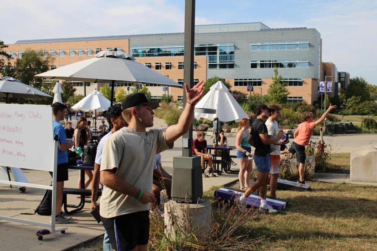 Students throw bean bags outside the UC North Mall in the afternoon, Friday, September 13, 2024.