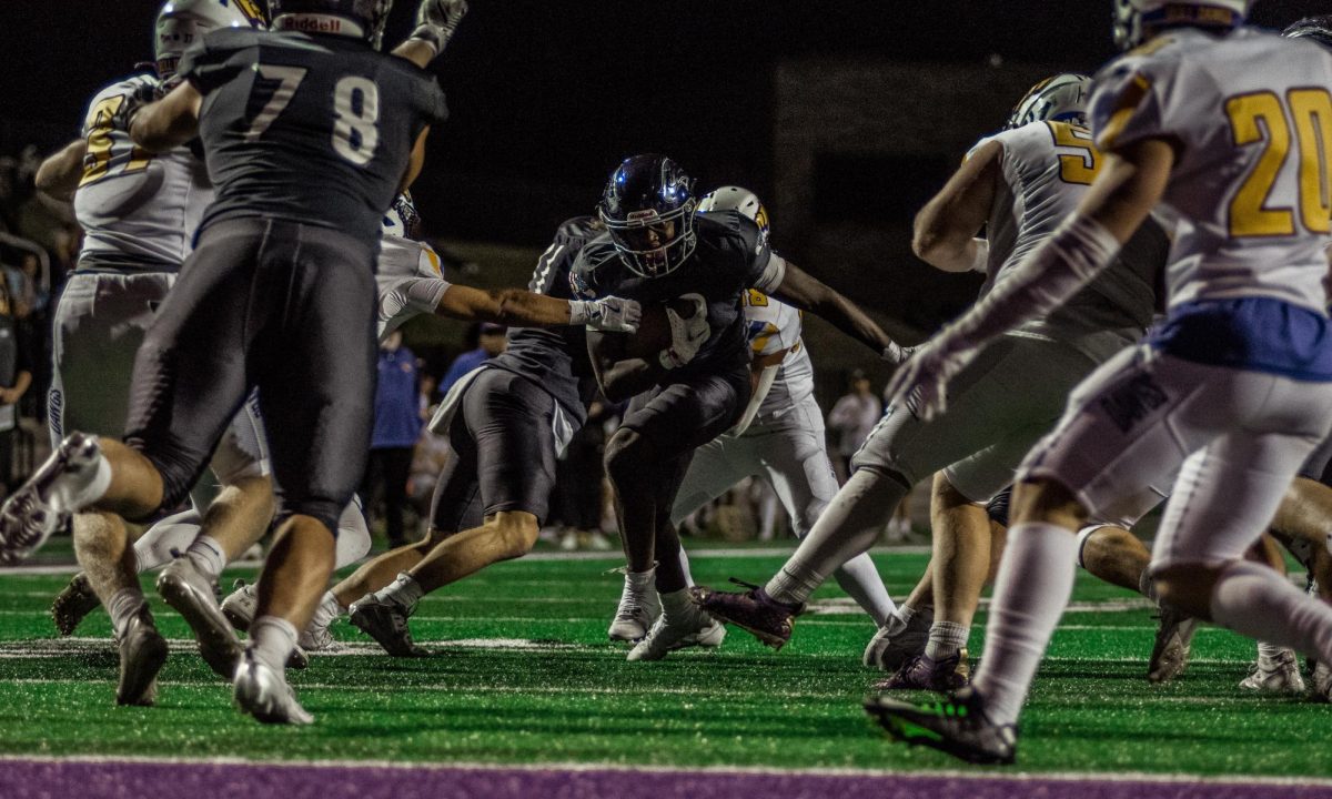  Senior Running Back, Tamir Thomas, breaking a tackle to score at Perkins Stadium Friday Oct, 18th, 2024.