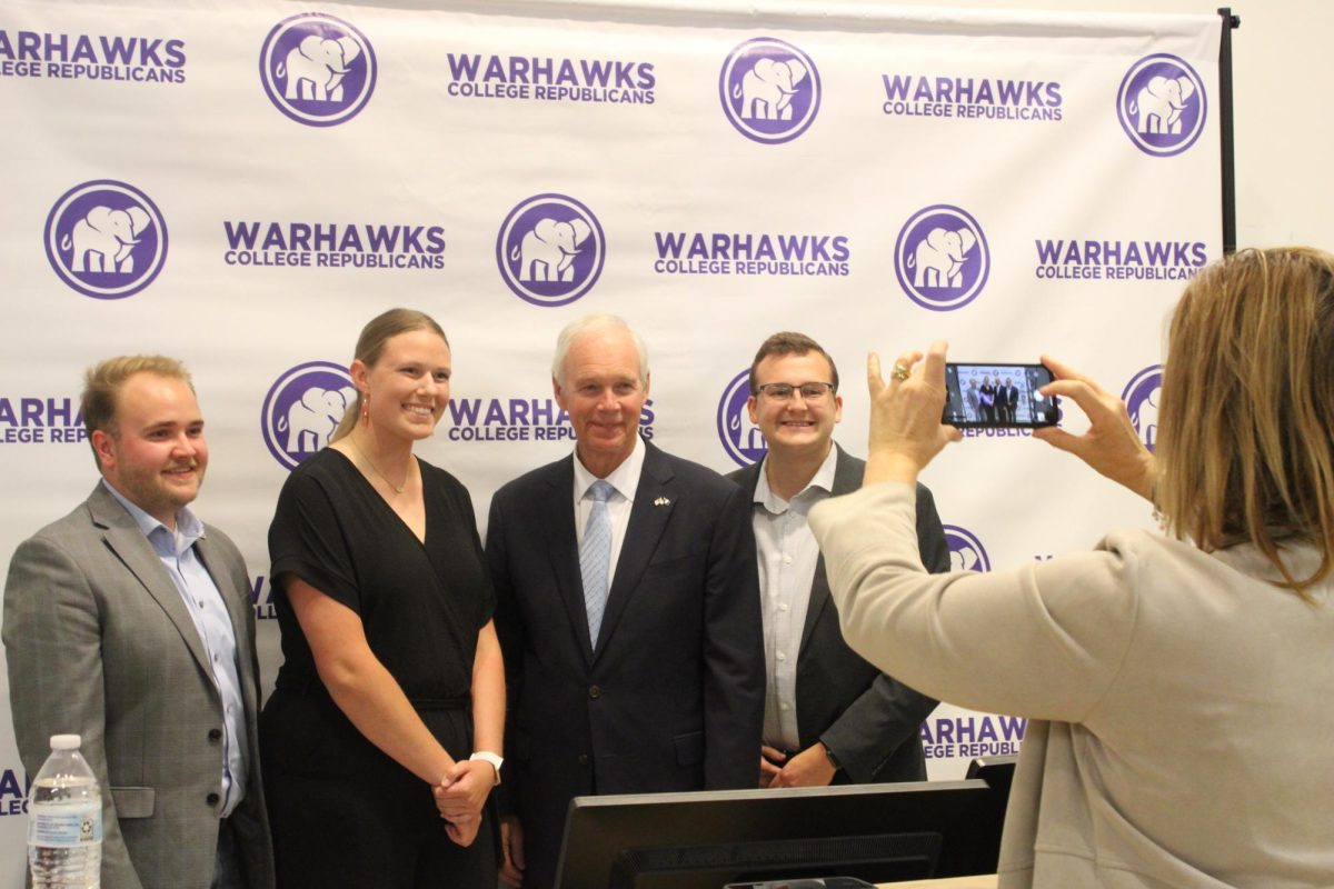 
Members of the College Republicans meet and greet Wisconsin Sen. Ron Johnson after his visit with the club on Monday, Oct. 7 at Upham Hall in Whitewater. Pictured, from left, UWW College Republicans Alumni Association executive director Trenton Kerbs; Chair of UWW College Republicans Sophia Fyfe, Sen. Johnson and UWW College Republicans Alumni Association President John Beauchamp.
