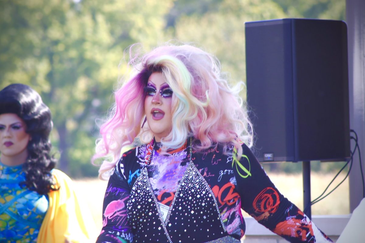 Drag Queen Lavender Jones, a former UW-Whitewater alumni performs a drag number at the Whitewater Pride Rally at Cravath Lake Park, Saturday afternoon, October 5, 2024.