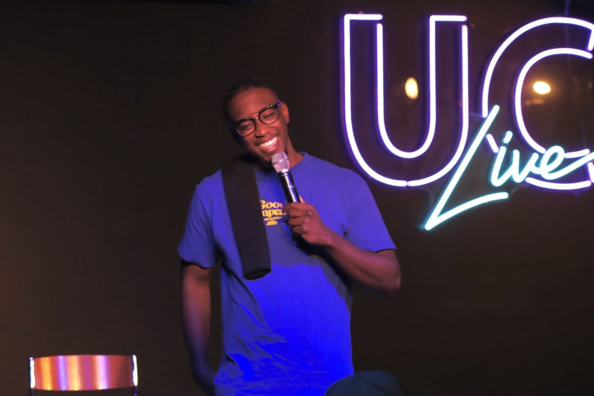  Comedian Trey Mack laughs at his own joke during his stand up in the Down Under of the James R Connor University Center, Thursday night, October 10, 2024.