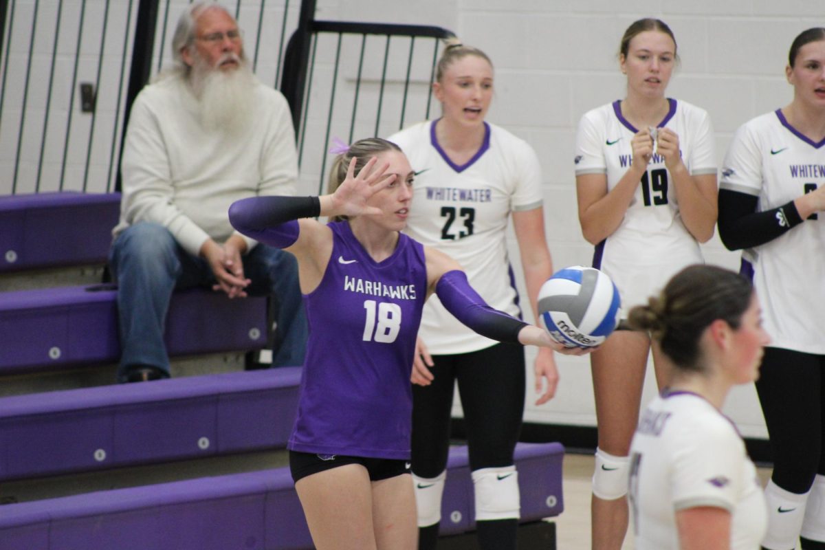 Defense Specialist number 18, Rylee Braunschweig, serving to the North Park
volleyball team Oct. 12, 2024.