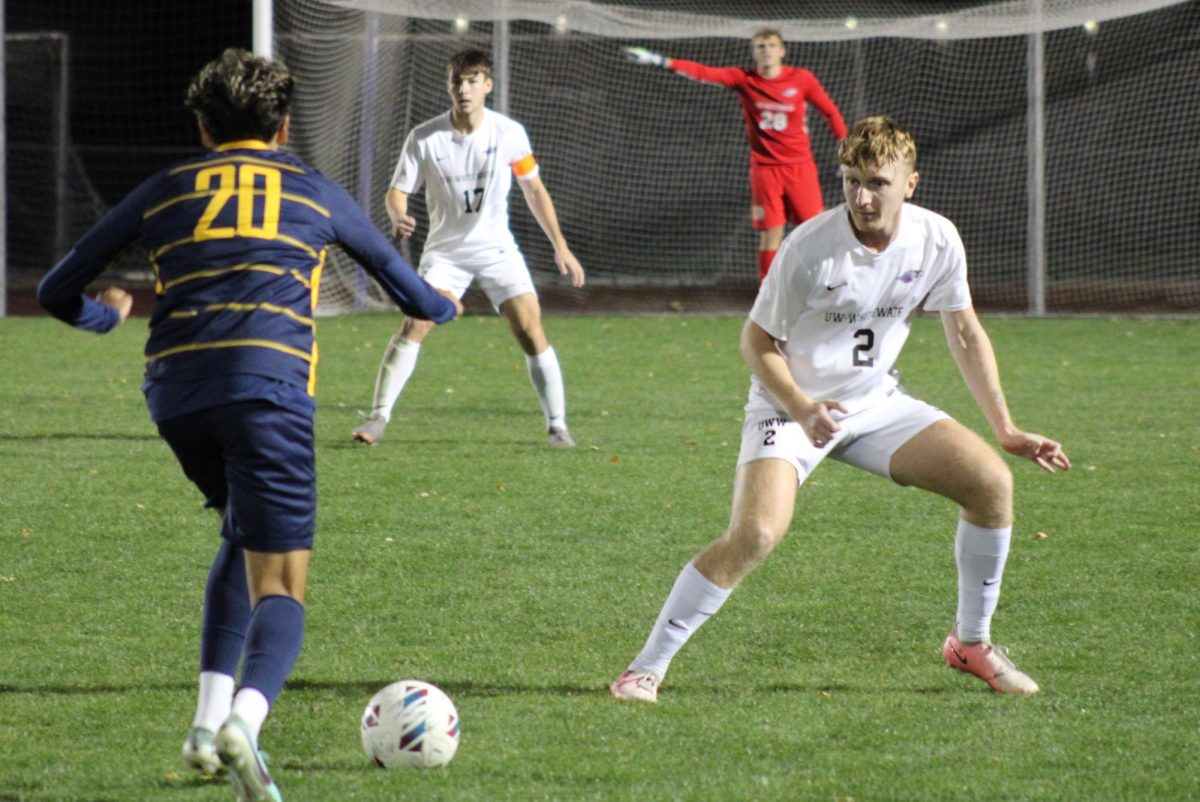 UW-Whitewater’s Matt White (2) defends against UW-Eau Claire’s Alvaro Alanis (20) during their soccer match Wednesday, Oct. 30, 2024 at Fiskum Field.
