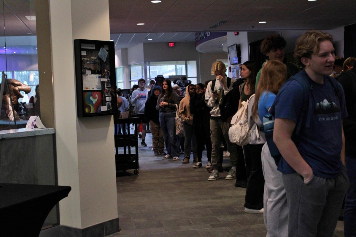 (4) The voting lines stretching around the entire University Center on Tuesday, November 5