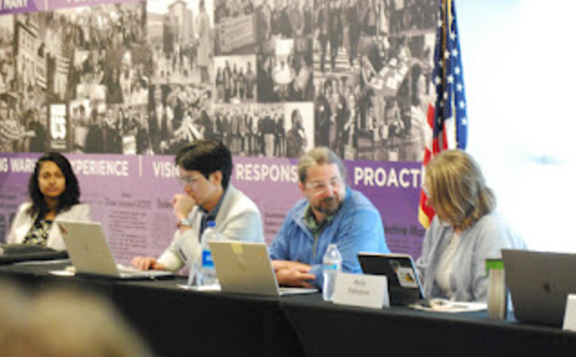 Members of the Faculty Senate convene for a meeting.