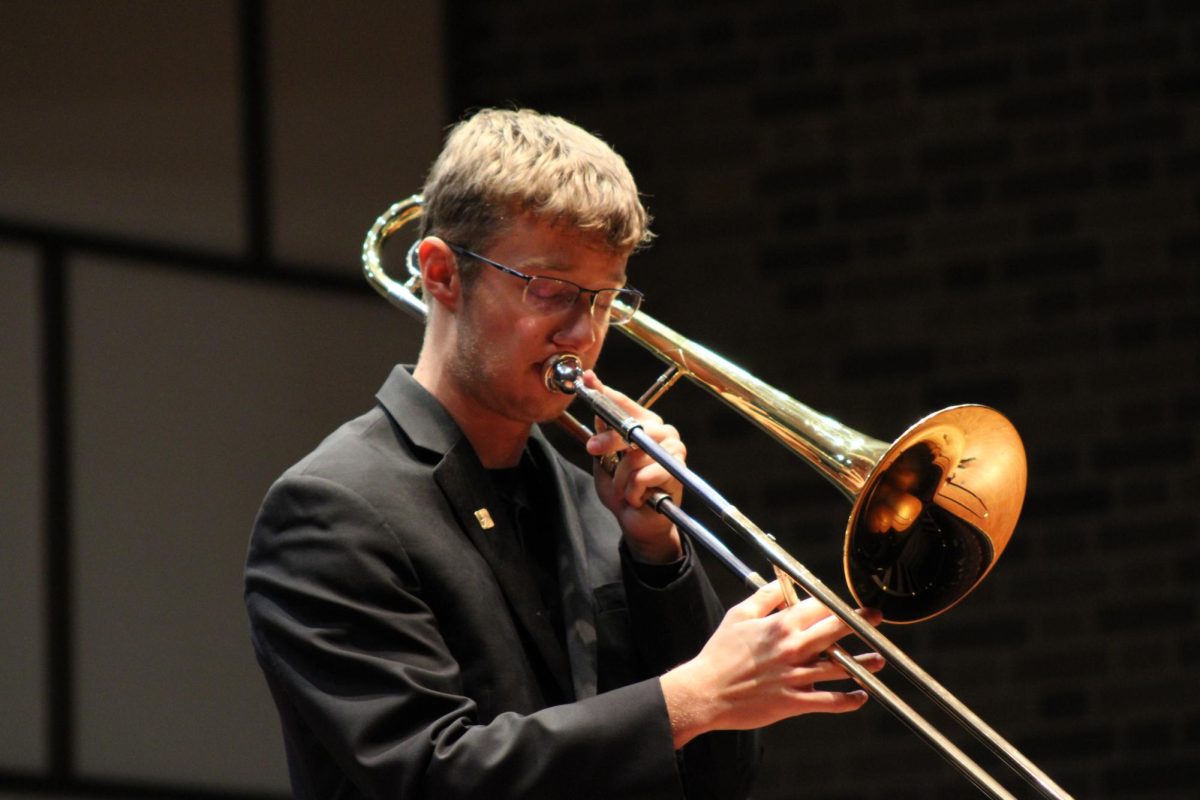 The Department of Music Jazz Combo I trombone player, Trevor Haglin, is playing “Q’s Blues” by Quentin Gilmore in the Light Recital Hall Nov. 19th 2024.