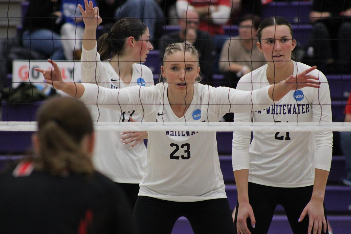 From left to right, Jenna Weinfurt, #17, Abbie Dix, #23, and Aubrie Krzus, #21 getting into position for Ohio Wesleyans serve in the Williams Center Nov. 21st 2024.