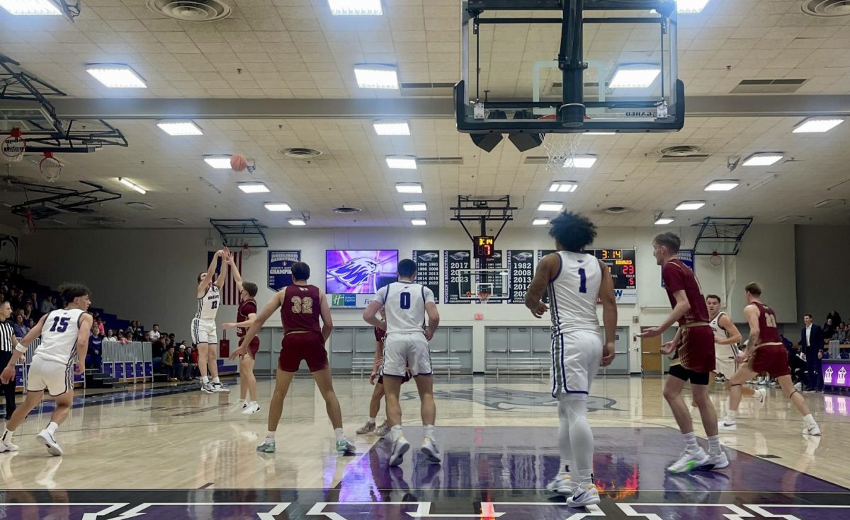 JT Hoytink hits a three against Coe College in Kachel Gymnasium, November 23, 2024.
