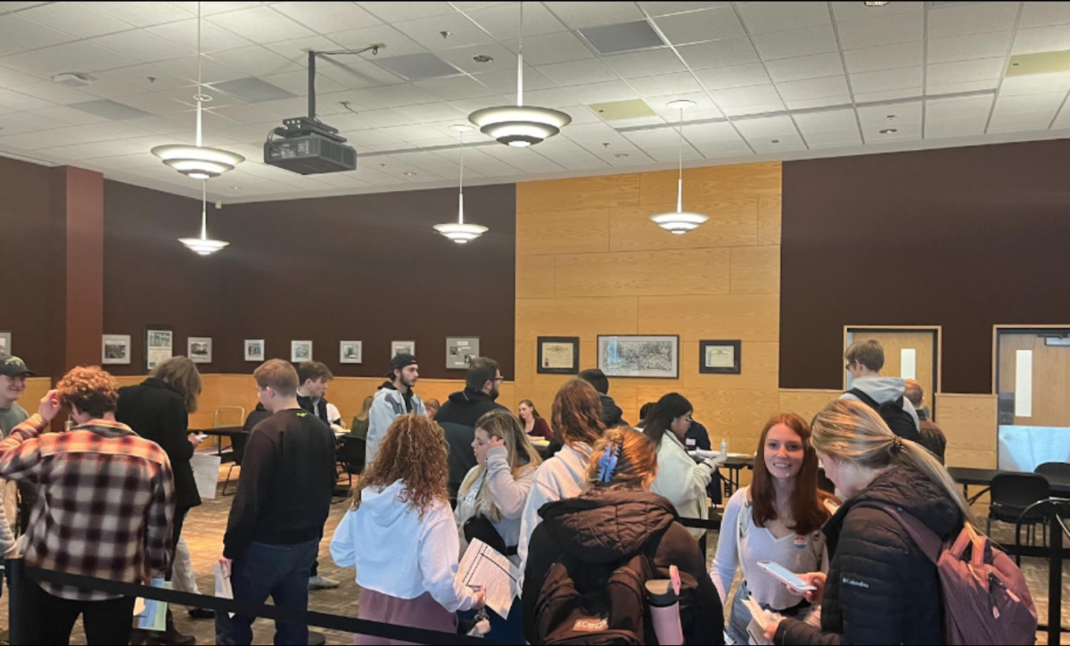 Students gather in the Hamilton Room ready to Vote.