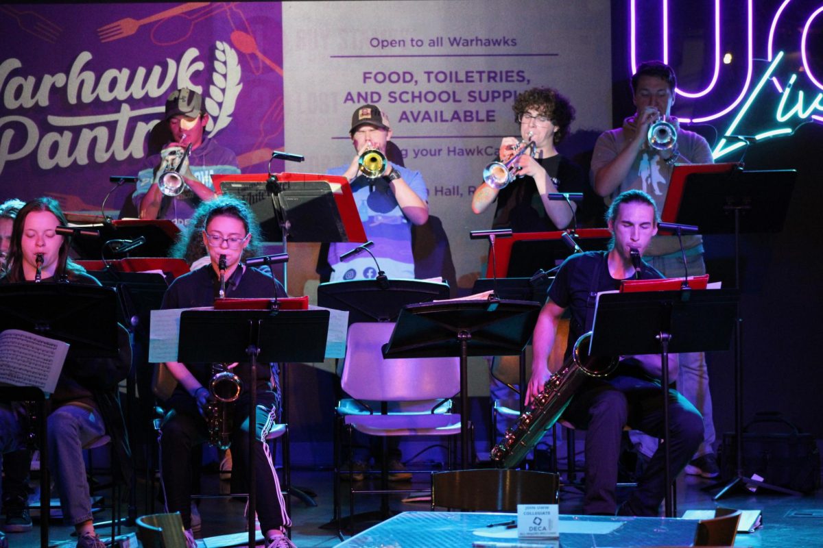 UW-Whitewater students play their instruments in the JEN Reading Band at UW-Whitewater’s Down Under in the University Center Nov. 6 2024.