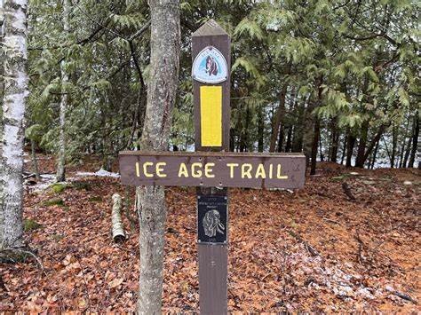 The Ice Age Trail is marked with trailhead signage and yellow “blazes” to guide hikers throughout the 1200-mile trail.
