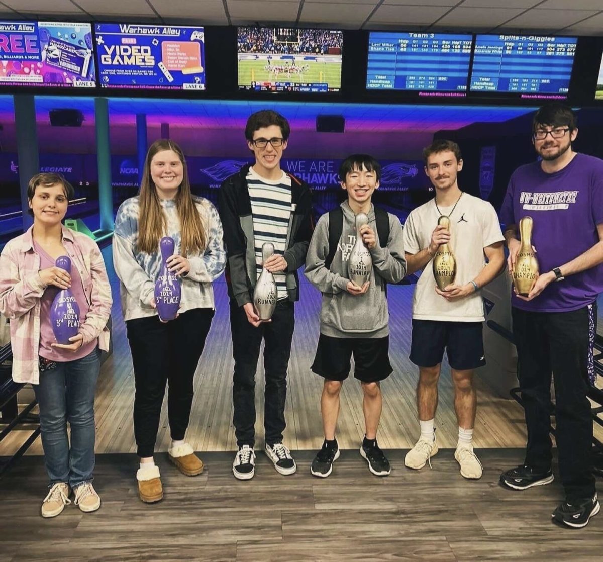 Shane Tisa (far right) recently won first place in the Warhawk Alley’s bowling league alongside his teammate, Levi Miller. (Warhawk Alley)
