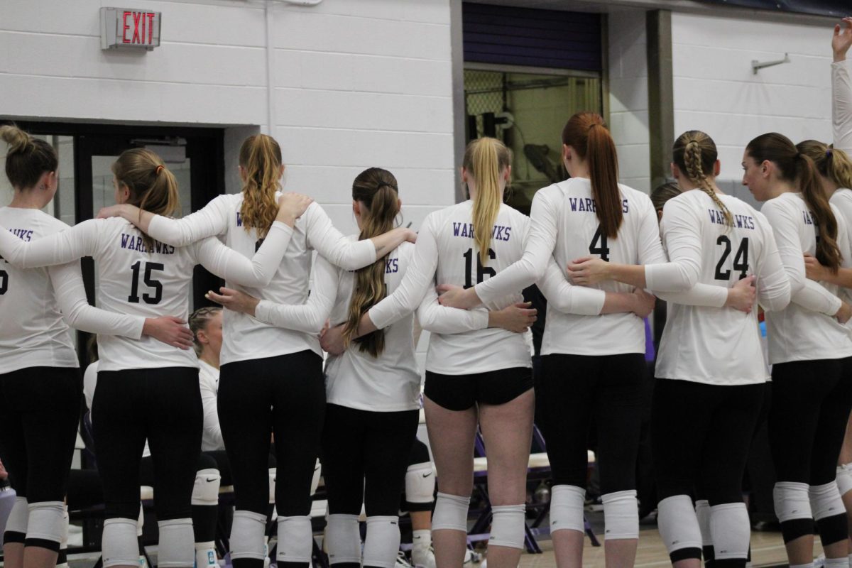 The UW-Whitewater volleyball team huddled up during the 2024 NCAA Regionals in Whitewater, Wisconsin at the Kris Russell Volleyball Arena. The Warhawks finished their 2024 campaign as runners-up to the Juniata Eagles, losing 3-2. The Eagles have now won three-consecutive national titles and have not lost a match since Friday, Sep. 16, 2022 against Trinity. 