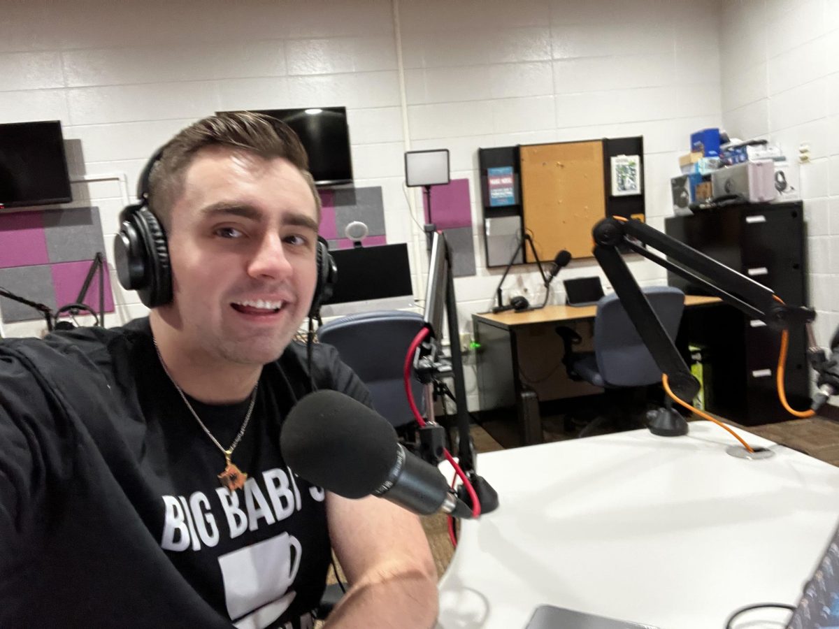 Bleron recording his podcast "Big Babi's Macchiato" at the Rock County campus