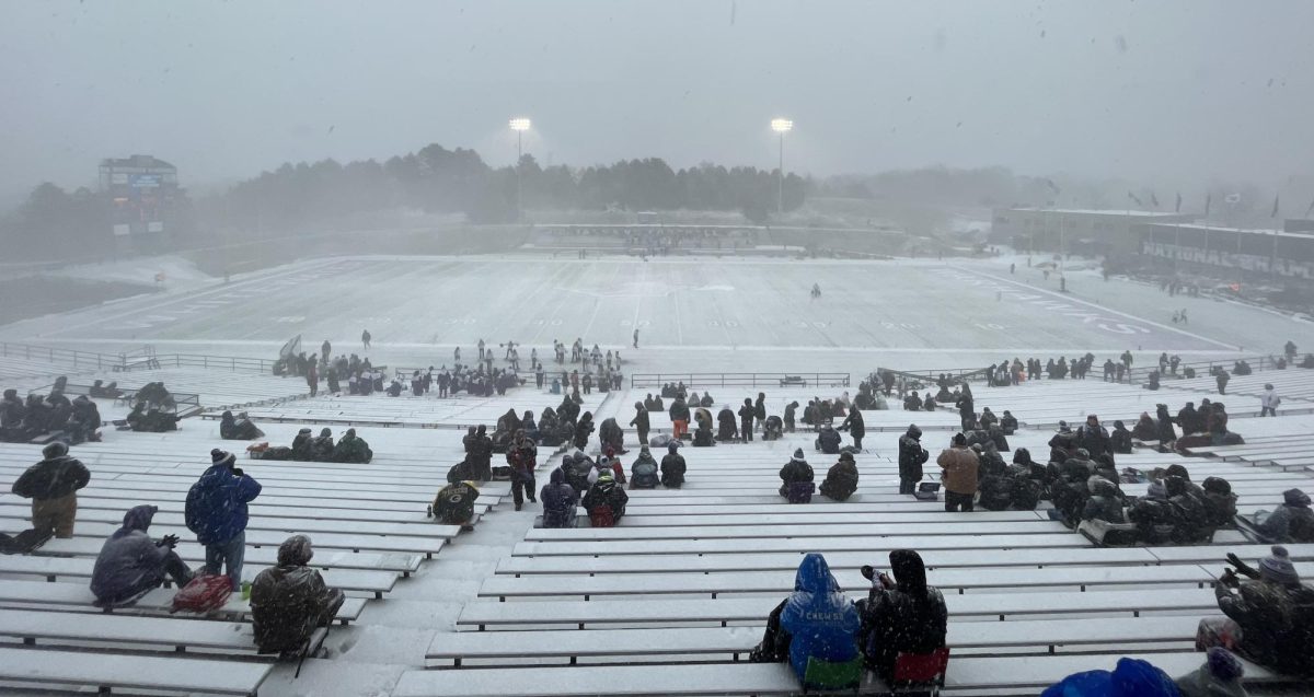 The Warhawk football team faced heavy snow for their NCAA Division III first-round playoff game against Aurora University at Perkins Stadium Nov. 19, 2022.