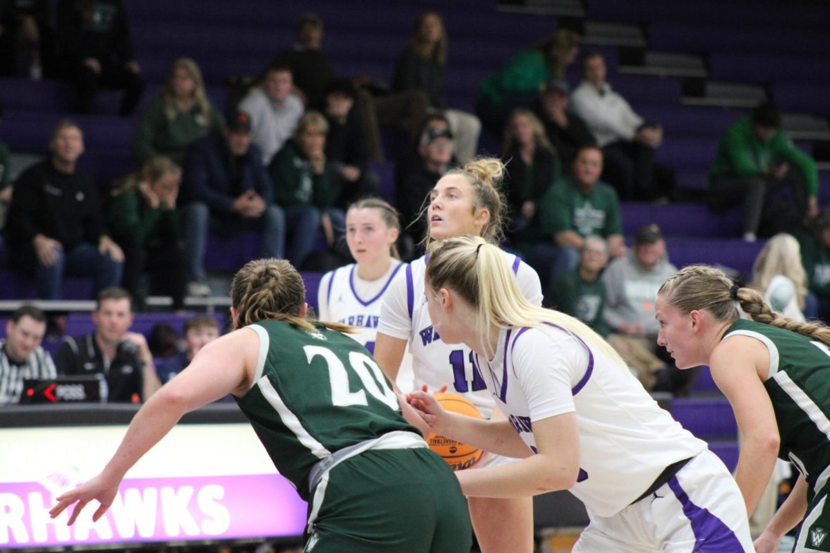 Maggie Trautsch (#11) attempts to make a shot, November 26, 2024.