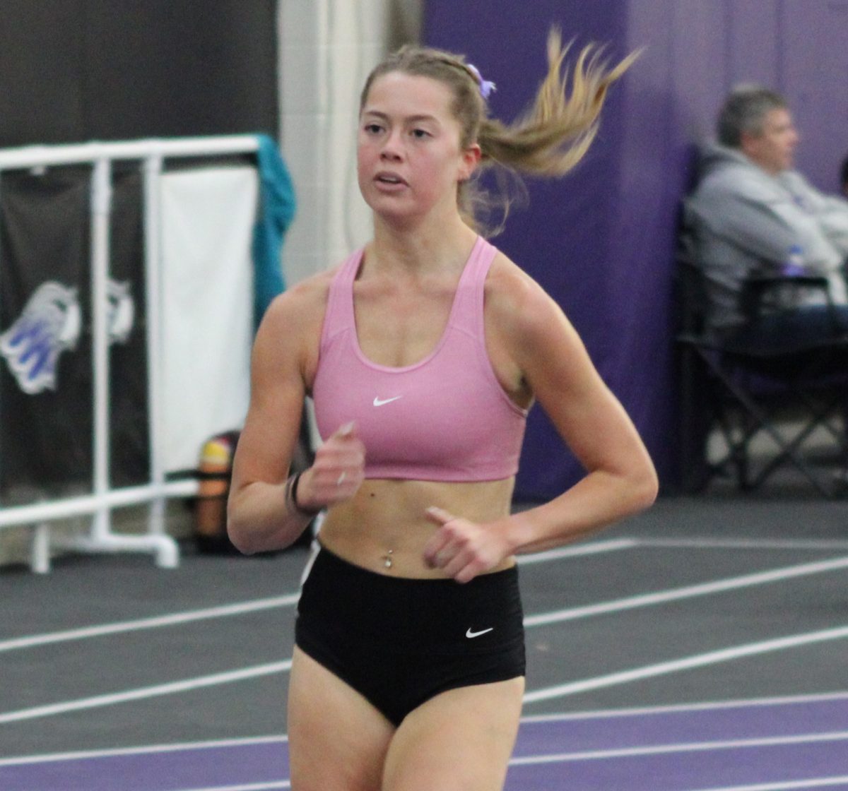 Junior distance runner Payton Scoggin running in the Track and Field Alumni/Intersquad meet on Saturday, Dec. 7. Scoggin also races for UW-Whitewater’s women’s cross country team during the fall. Scoggin finished her cross country season placing 19th in the NCAA Regionals after clocking a time of 22:39.7.