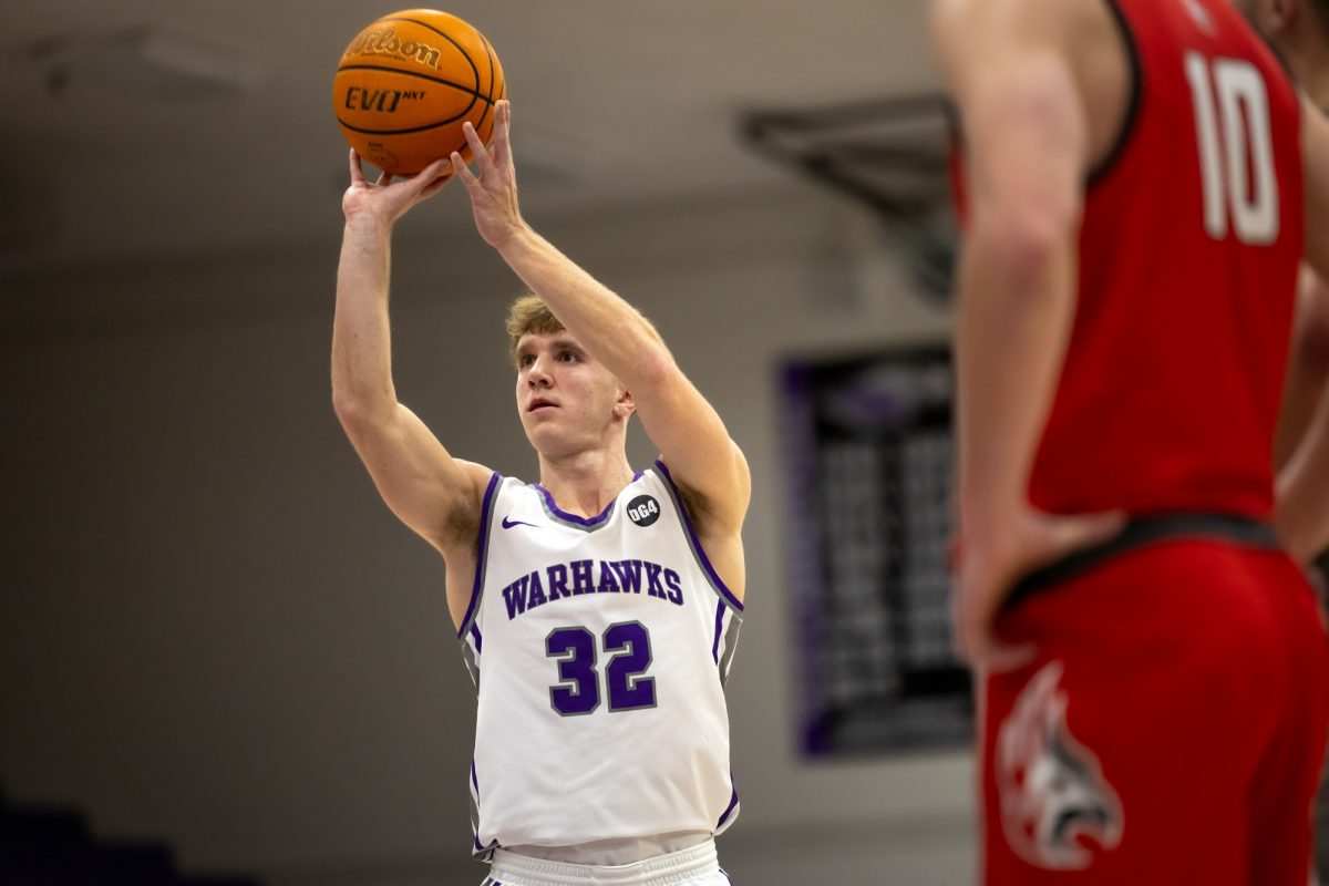 Junior guard Luke Bara shoots a free throw against Carthage College, Nov. 30.