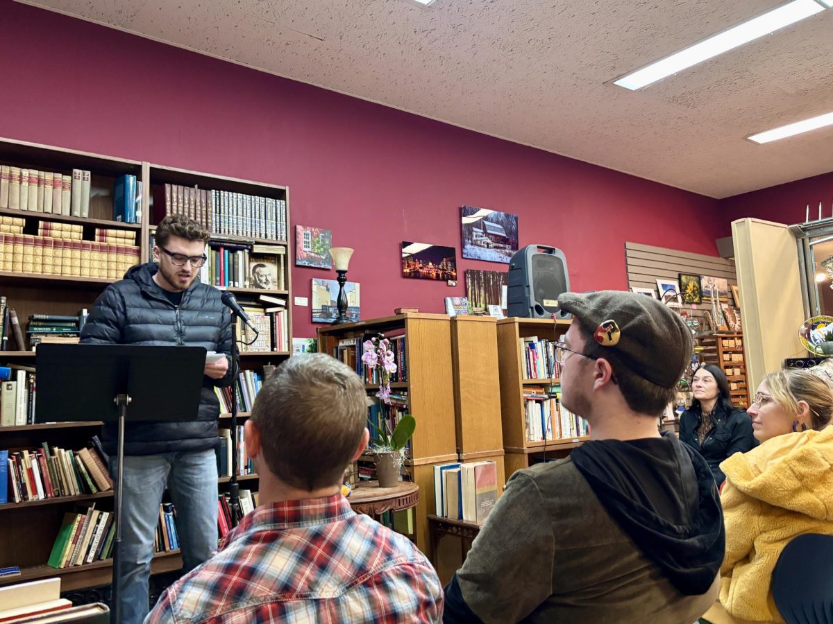 
Colby Flade shares his poetry during the Poetry Infusion crowd at The Book Teller on February 22, 2025.
