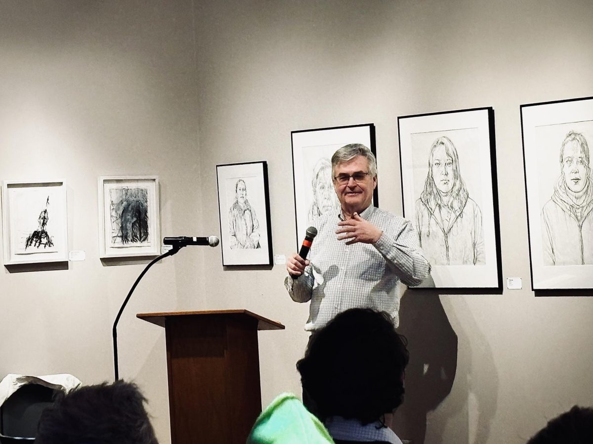 Craig speaking at the Neighbors Art Gallery in the University Center, February 18, 2025.