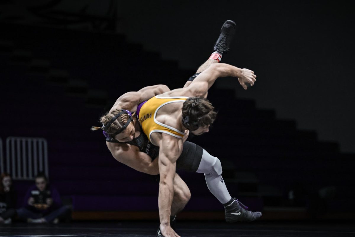 Sophomore Brayden Peet, who earned All-American honors at the 2025 NCAA Division III National Championships, wrestles against a UW-Stevens Point wrestler.
(Contributed)