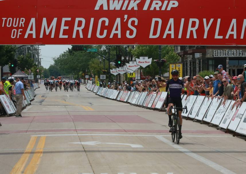 Cycling club president, Jack Heier biking across the finish line at The Tour of America’s Dairyland in the summer of 2024.