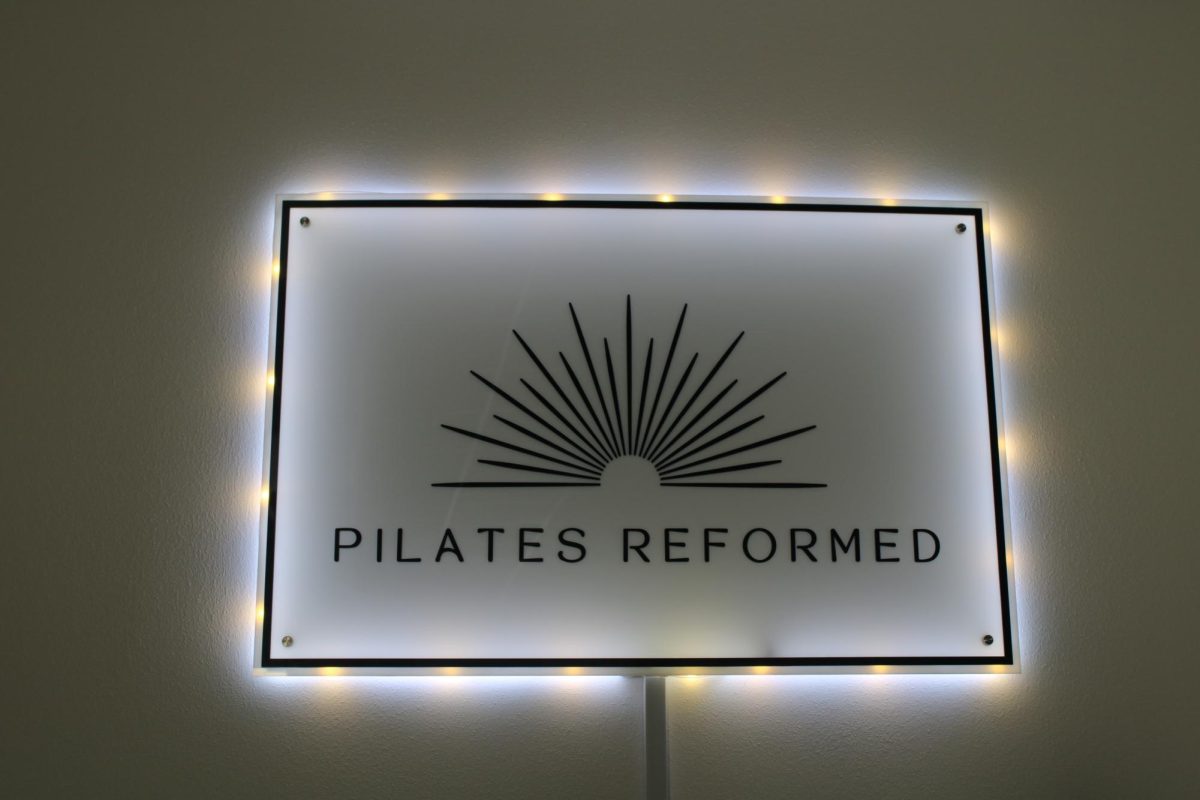 The Pilates Reformed sign in the newly opened business Feb. 21, 2025.