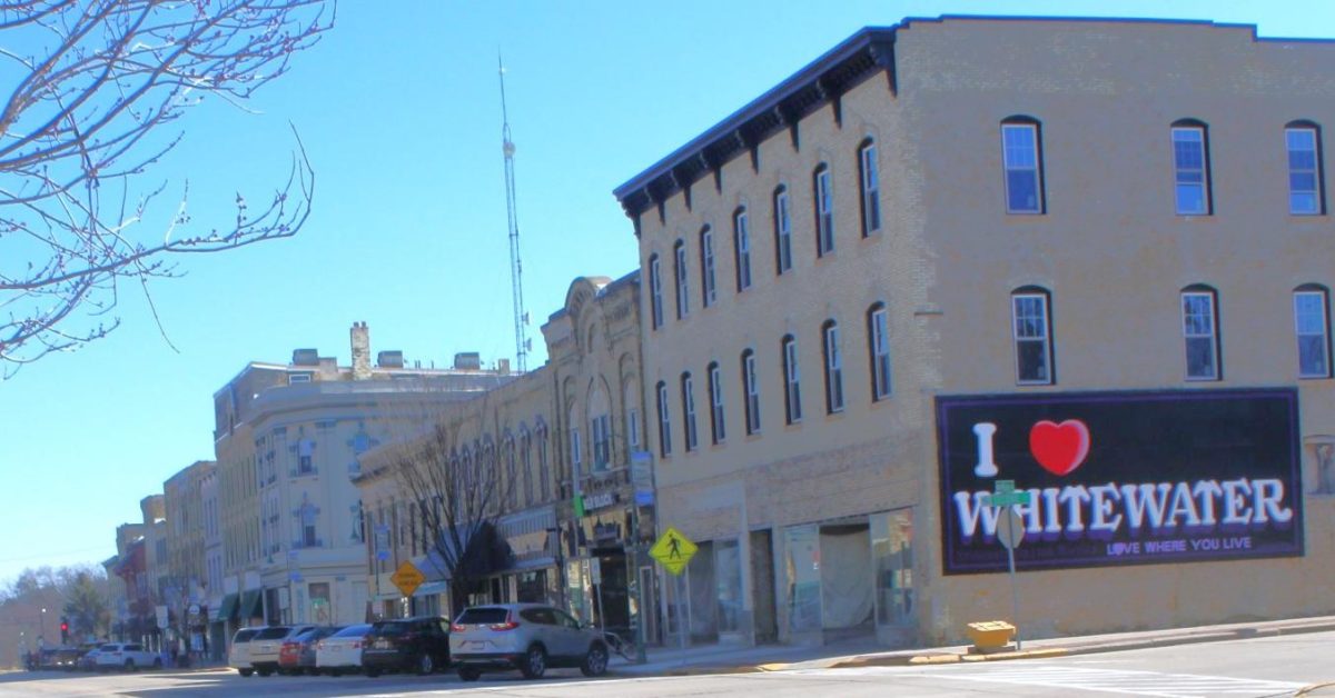 Cars fill up Main Street parking spots in downtown Whitewater on a sunny Saturday afternoon Mar. 8 2025.