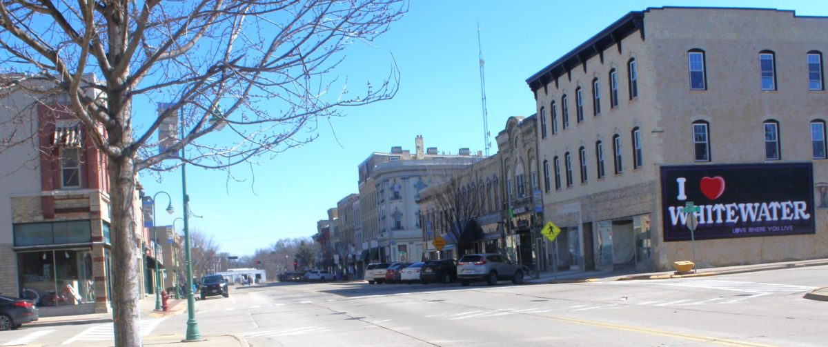 Cars fill up Main Street parking spots in downtown Whitewater on a sunny Saturday afternoon Mar. 8 2025.