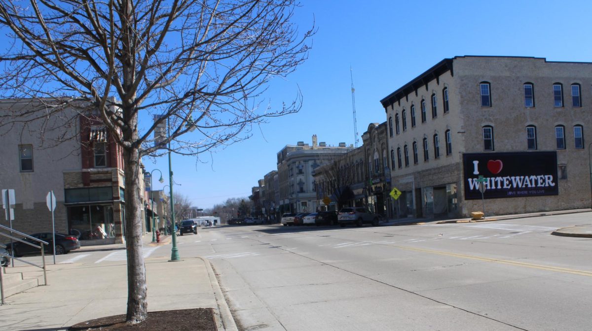 Cars fill up parking spots in downtown Whitewater on Main Street on a sunny Saturday afternoon Mar. 8 2025.
