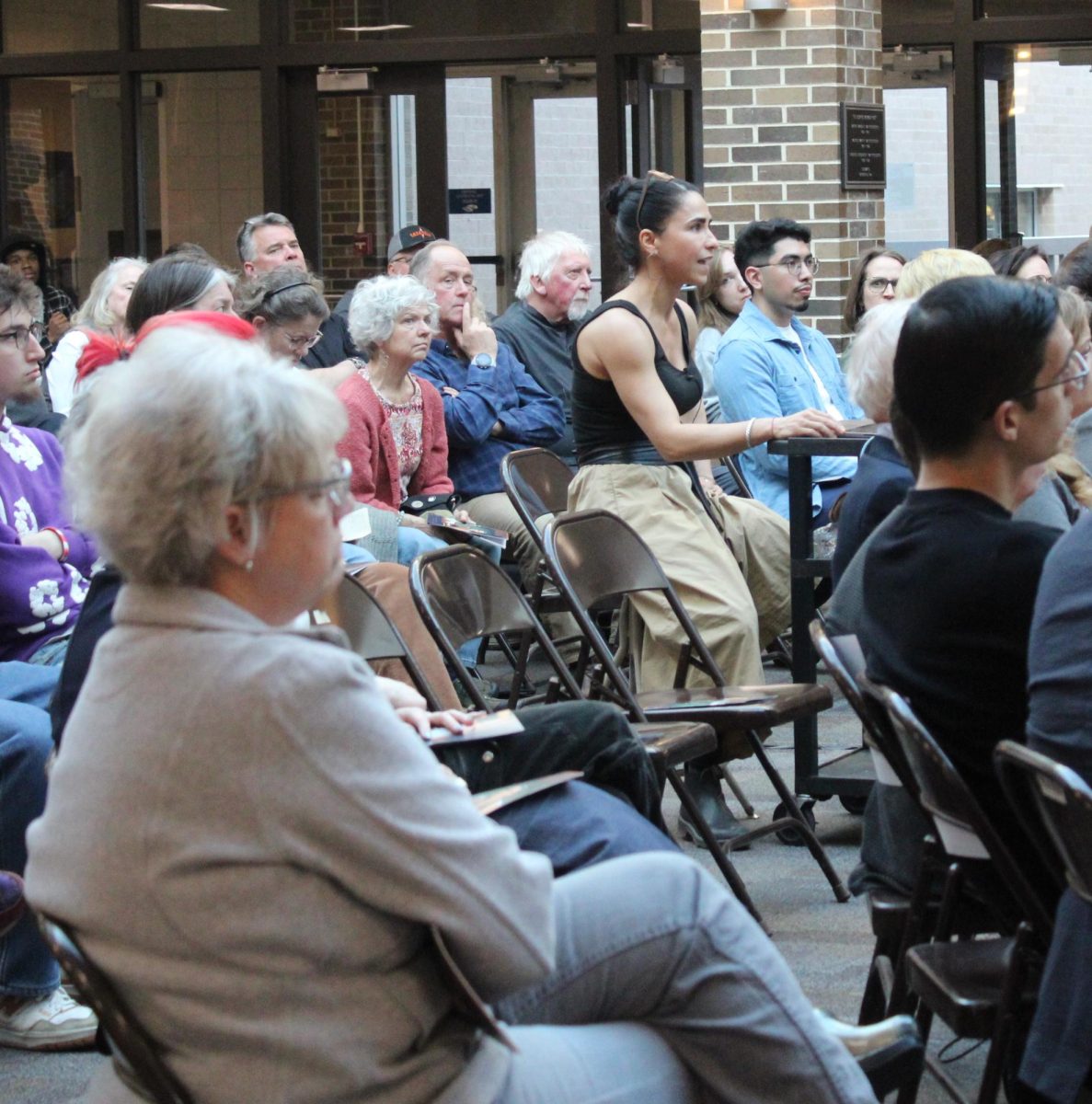 2025 Schuh visiting artist Cristina Córdova(middle) speaks to UW-Whitewater students and the Whitewater community on her various works at the Embodied Connections event held at UW-Whitewater’s Greenhill Center of the Arts Atrium on Mar. 13, 2025.