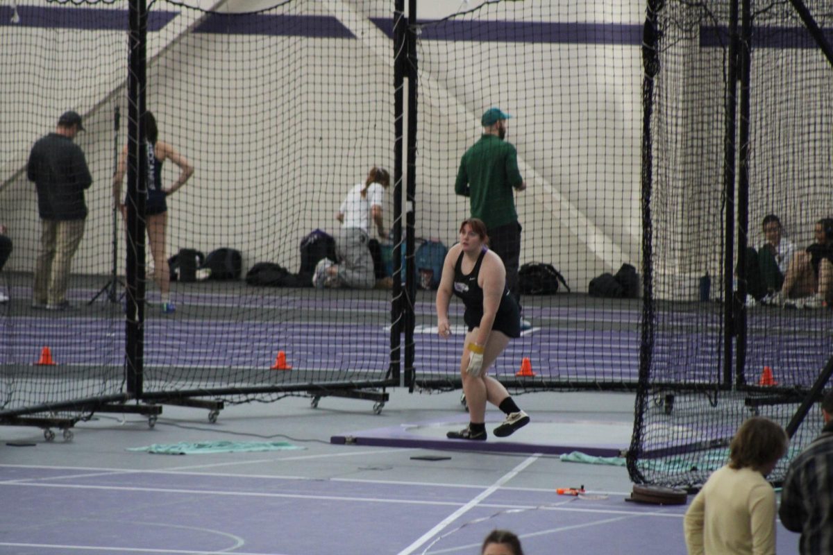 UW-Whitewater women’s track and field weight thrower finishes a throw during the Karl Schlender Invitational at UW-Whitewater’s D.L.K. Kachel Fieldhouse at Leonard “Squig” Converse Track Jan 25 2025.