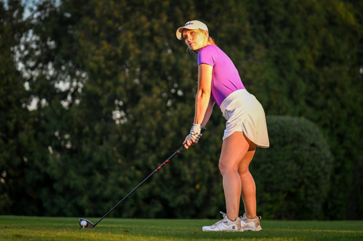UW-Whitewater golfer Ellie Johnson lines up for her shot at the Illinois Wesleyan Fall Invite, Sept 16, 2023. 
(Courtesy of Ellie Johnson)