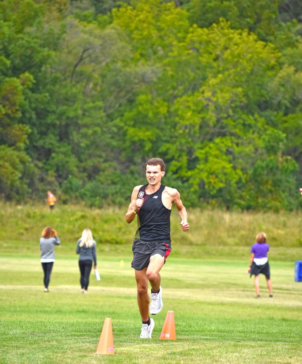 UW-Whitewater Men’s Cross Country senior, Tommy Conklin races towards the finish line as the first runner to cross it for the men’s race at the UW-Whitewater Cross Country Alumni-Intrasquad Meet on August 30th, 2025 on the UW-Whitewater Campus Course.
