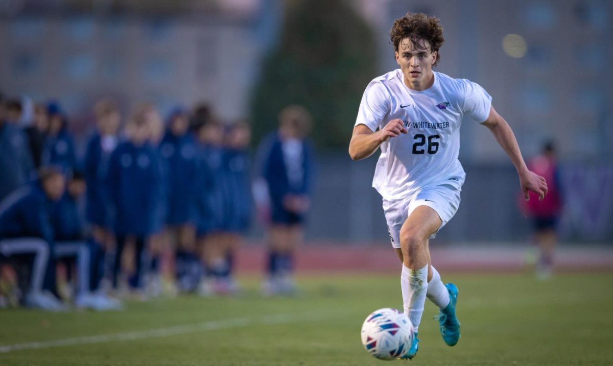 Kiraly runs with the ball during UW-Whitewater's 7-0 win V.S. UW-Stout.