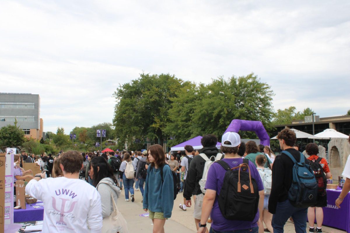Students wander around and interact with various clubs in front of the University Center, Wednesday, September 10, 2025.