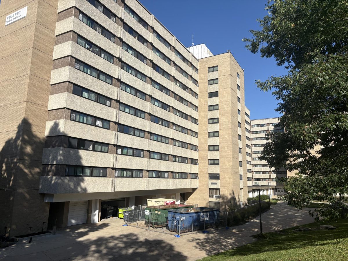 An armed gunman was seen near the Wells Hall complex around the same time shots were fired a quarter-mile off campus.