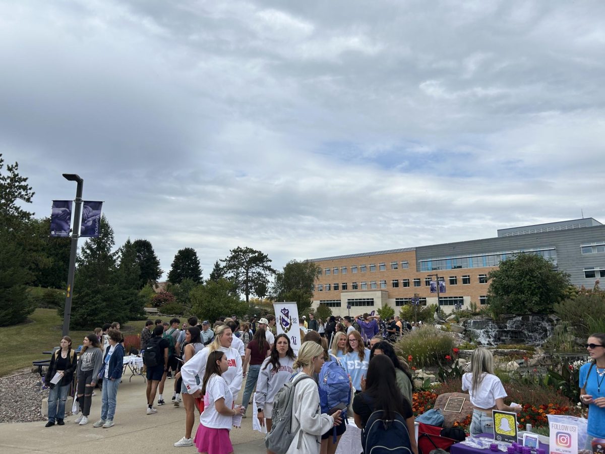 Students interact with several Greek tables near the University Center, Wednesday, September 10, 2025