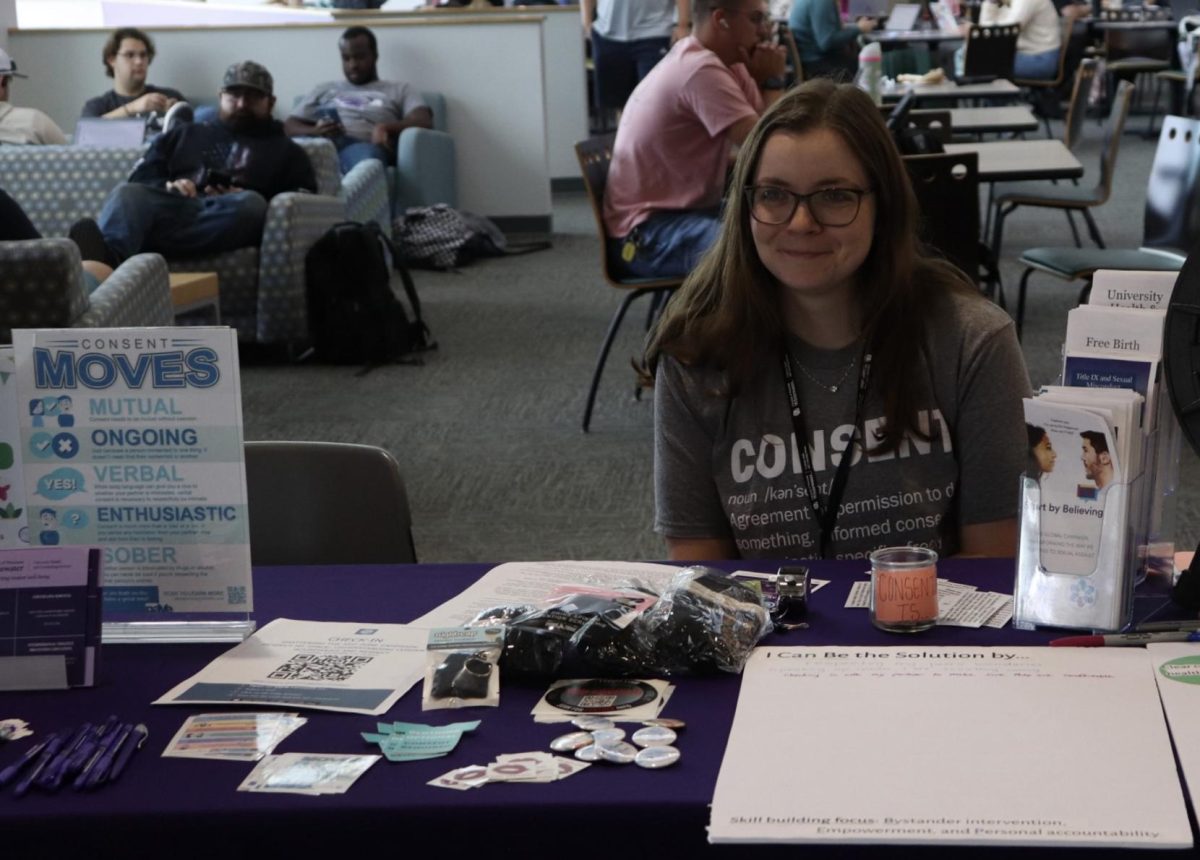 Student promoting the Shattering the Red Zone Campaign in the University Center located in University of Wisconsin- Whitewater on September 4, 2025.