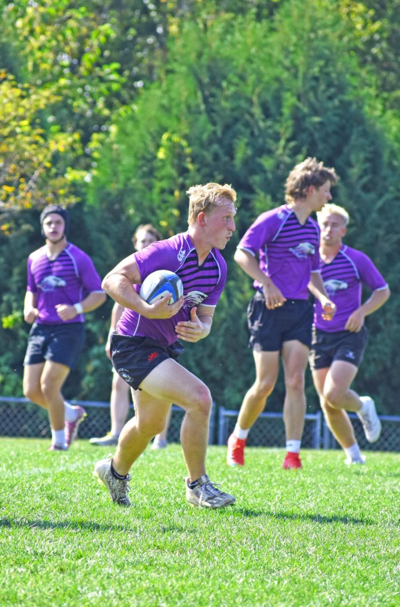 UW-Whitewater Club Rugby Austin Skrundz runs the ball up the field to score against UW-Stout on September 14th, 2025 at the Wisconsin Rugby Sports Complex.